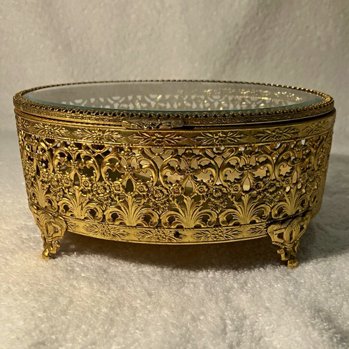 Gold tone ornate filigree oval - tone,